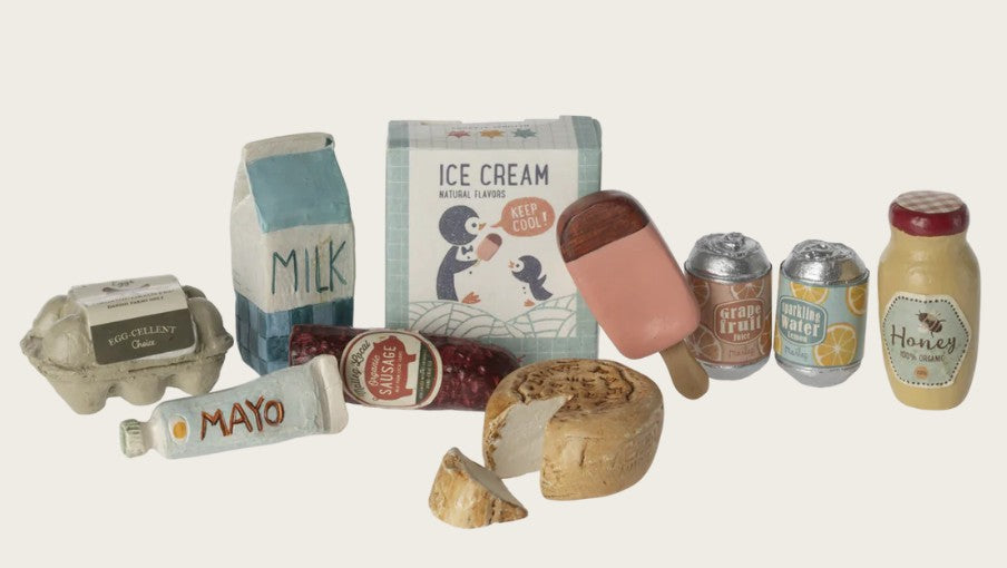 The Maileg Grocery Box, Miniature by Maileg includes toy foods like a milk carton, ice cream box, popsicle, and eggs—perfect for imaginative play or as charming accessories for your Maileg Mouse grocery setup.