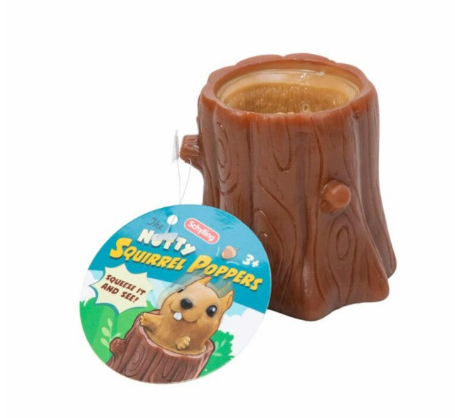Introducing the Nutty Squirrel Popper by Schylling Toys—a charming brown tree stump-shaped toy with a circular hole at the top, designed as a playful and engaging sensory toy. The attached tag features "Nutty Squirrel Popper" and depicts a cartoon squirrel bursting out of the stump, making it an ideal stress relief and fidget toy for enthusiasts.