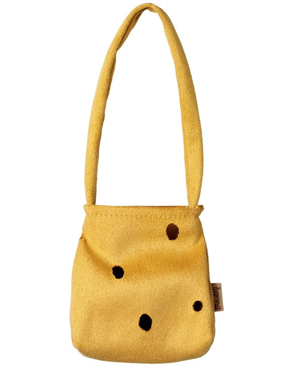 A small yellow Maileg Cheese bag with a long strap and black spots—designed to look like Swiss cheese—perfectly sized for pretend play with your Medium Mouse from Maileg.
