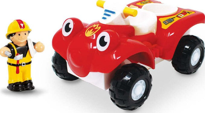 Fire Buggy Bertie by Smart Toys is a red fire rescue quad bike with cartoon eyes and a flame emblem, standing beside a smiling firefighter toy figure—ideal for imaginative role-play adventures.