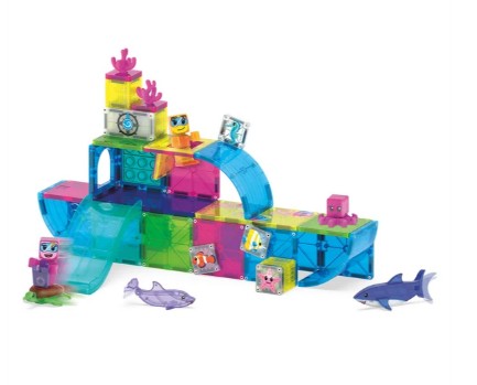 The Magna-Tiles Undersea Adventure 58-Piece Set by Magna-Tiles features colorful magnetic building blocks that can be assembled into a submarine shape, surrounded by playful animal figures and sea creatures like a shark and fish, creating an exciting ocean-themed play scene.