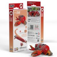 Packaging of the EUGY Crab 3D Puzzle by Eugy, showcasing a vibrant red 3D crab model, assembly instructions, product details, and an image of a real crab on the back. This eco-friendly toy serves as both a STEM craft kit and an engaging educational activity for ages 8 and up.