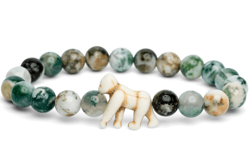 Fahlo’s Traverse - Rainforest Green Gorilla bracelet features round green and white marbled stones with a carved gorilla charm—perfect for supporting gorilla conservation.