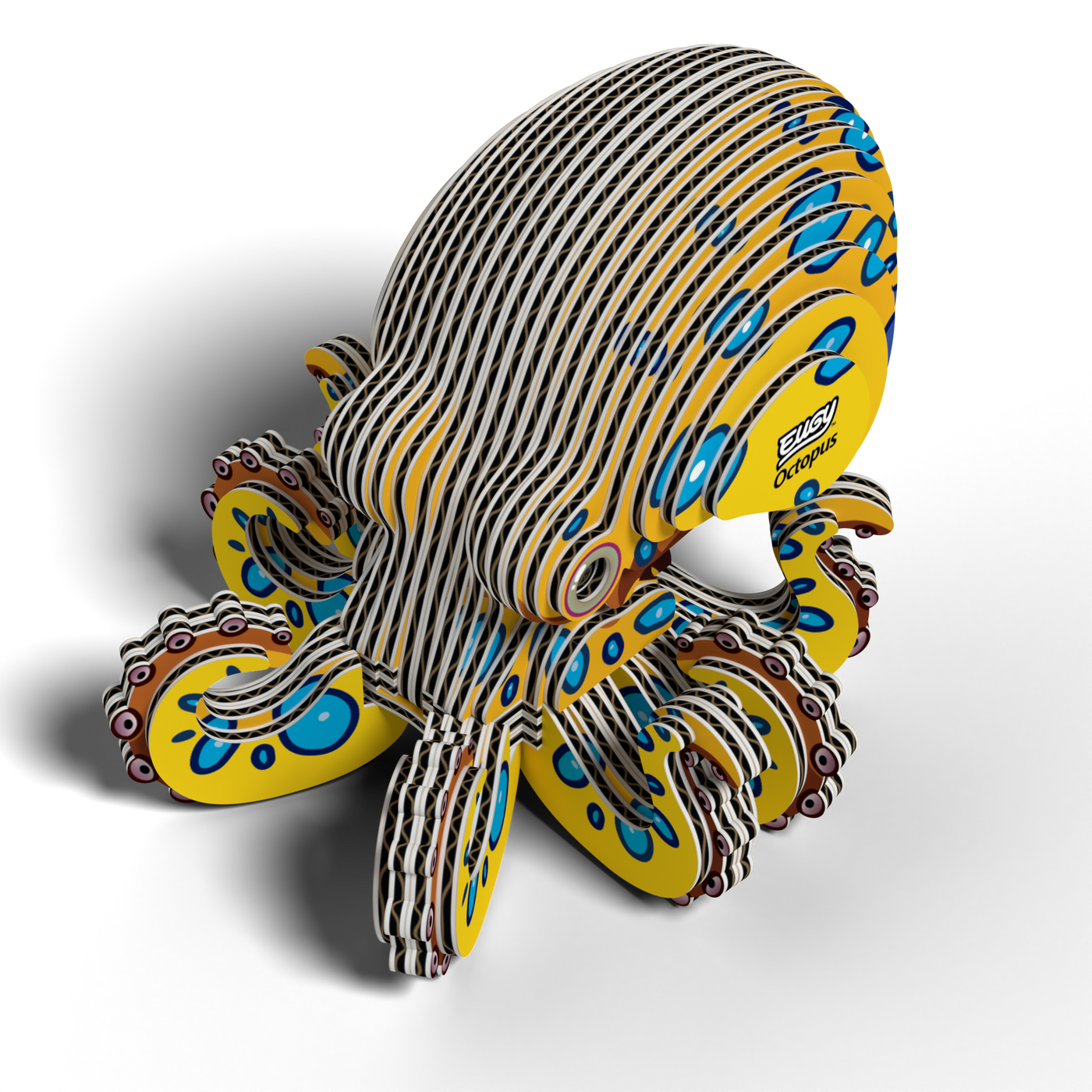 A colorful, layered model of a crab made from interlocking pieces with yellow, blue, and red patterns creates a striped 3D effect. The Eugy EUGY Crab 3D Puzzle features a playful and artistic style, making it an engaging STEM toy for creative minds.