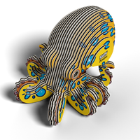 A colorful, layered model of a crab made from interlocking pieces with yellow, blue, and red patterns creates a striped 3D effect. The Eugy EUGY Crab 3D Puzzle features a playful and artistic style, making it an engaging STEM toy for creative minds.