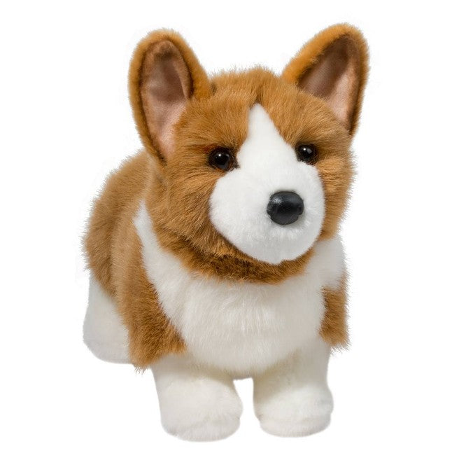 Ingrid Corgi by Douglas is a soft plush toy with brown and white fur, perky ears, black eyes, and a black nose, sitting upright against a plain white background.