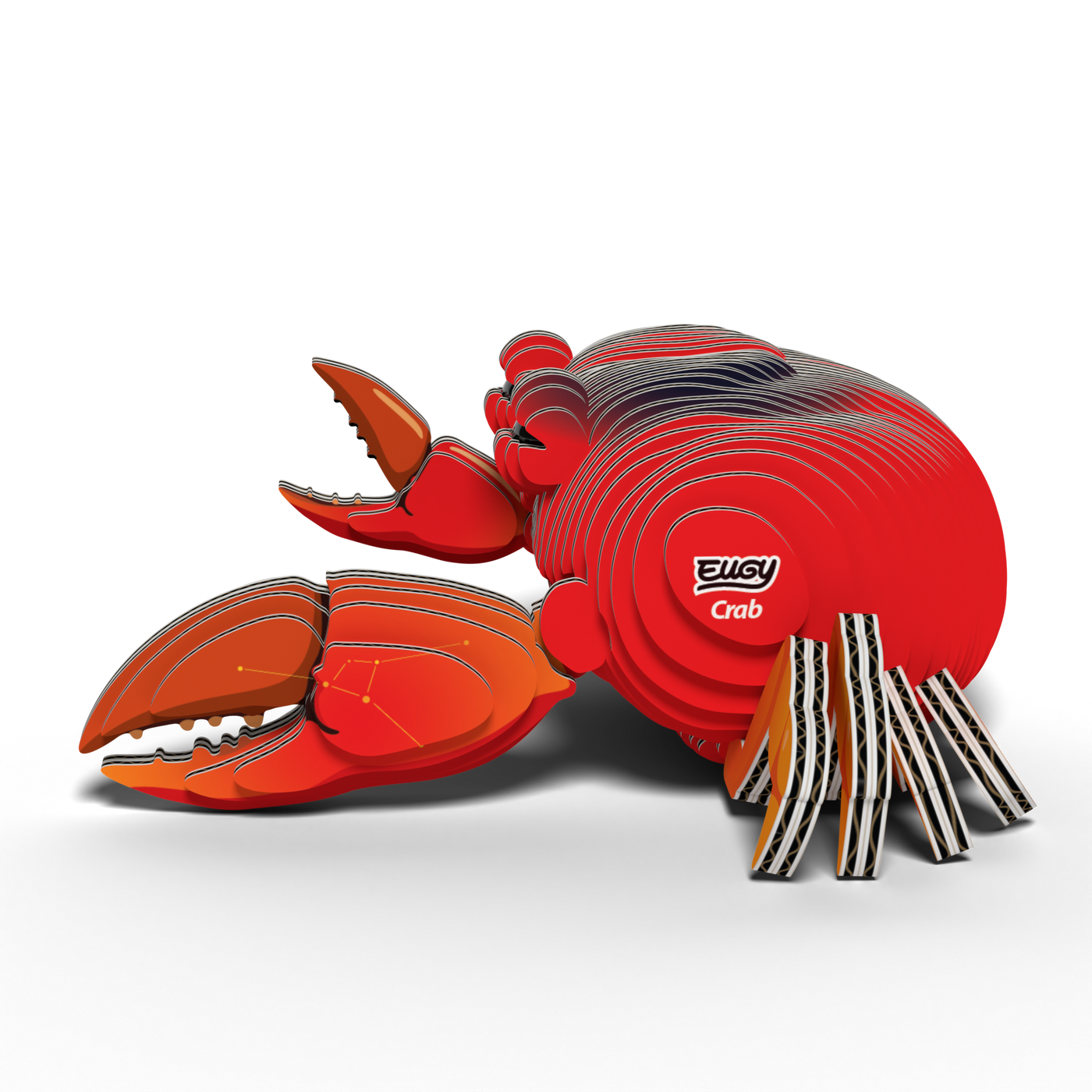 The EUGY Crab 3D Puzzle by Eugy is a colorful, layered model featuring a red crab with large claws and striped black-and-white legs. This eco-friendly toy serves as both a fun STEM craft and an educational activity. The words "Crab" and the brand name "Eugy" are visible on its body, all set against a plain white background.