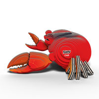 The EUGY Crab 3D Puzzle by Eugy is a colorful, layered model featuring a red crab with large claws and striped black-and-white legs. This eco-friendly toy serves as both a fun STEM craft and an educational activity. The words "Crab" and the brand name "Eugy" are visible on its body, all set against a plain white background.