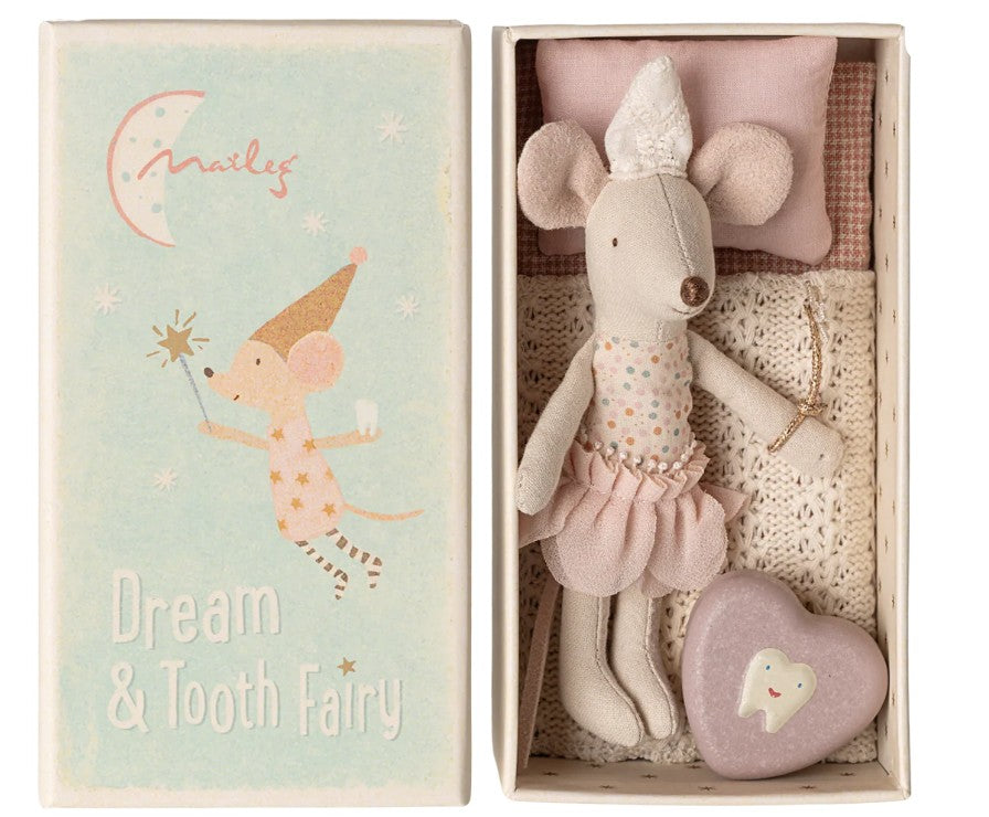 The Maileg Tooth Fairy Mouse, Little Sister In Matchbox by Maileg comes dressed as a fairy with a pillow, blanket, and heart-shaped tooth box in her matchbox bed. The lid shows "Dream & Tooth Fairy" and an illustration of the fairy mouse.