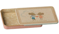 A small rectangular metal box from Maileg with a sliding lid, partially open to reveal two Maileg mice in striped outfits holding a heart, along with LIMITED EDITION written below. The Maileg Metal box w. sliding lid - Mice features decorative interior details and patterned edges, making it a charming miniature storage solution.