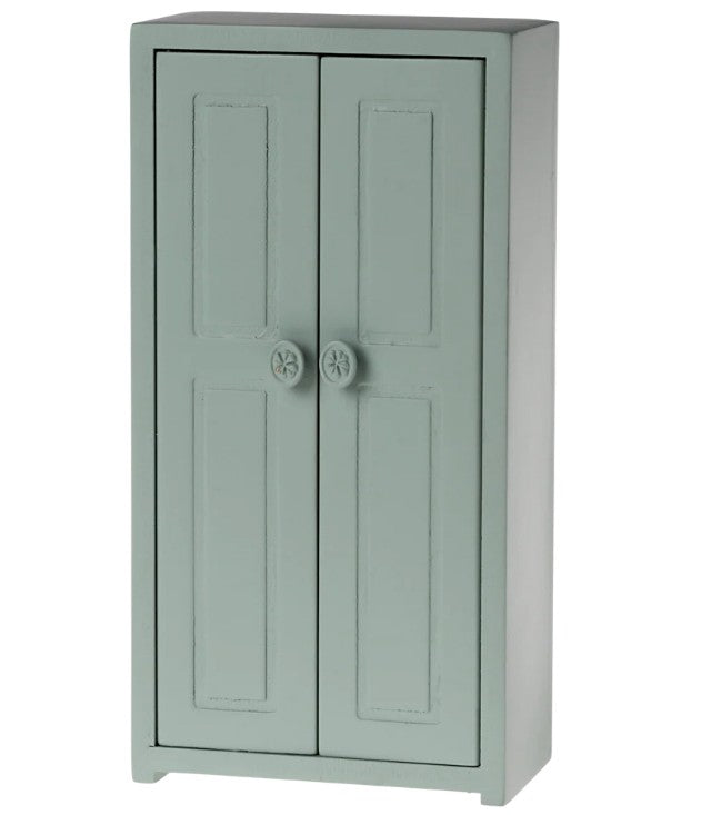 The Maileg Closet, Mouse - Soft Blue by Maileg is a tall mouse-sized closet with two paneled doors and round knobs, perfect for dollhouse furniture or storing Maileg Mouse accessories, displayed against a plain white background.