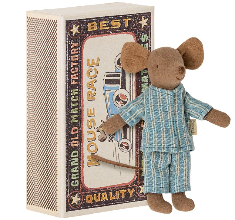 The Maileg Big Brother Mouse in Matchbox by Maileg features a small mouse in blue-striped pajamas and a decorative matchbox bed with vintage-style Mouse Race artwork.