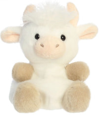 The 5" Halleigh Highland Cow by Aurora is a plush white and tan stuffed animal featuring soft fur, round black eyes, a beige snout, tan feet, and small beige horns. Sitting upright against a plain white background, it's perfect as a collectible toy for any animal lover.