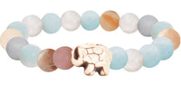 The Expedition - Sky Stone Elephant bracelet by fahlo features pastel blue, white, tan, and pink beads with a cream elephant centerpiece—a perfect accessory for anyone who loves elephant conservation.