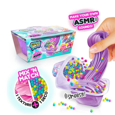 A hand stretches purple Craze Sensations ASMR slime with colorful beads, providing sensory fun for all. The text reads "Make Your Own ASMR Sounds!" and "Mix N Match: 1 Texture + 1 Deco." The License 2 Play packaging is shown in the background, making this a must-have addition to your collection of ASMR collectibles.