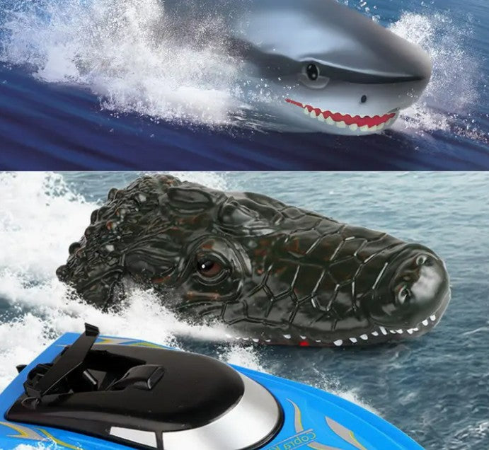 Jupiter Creations, Inc's CrocSharkboat R/C 2.4G set includes two remote-control vehicles—a shark with an open mouth and visible teeth, and a crocodile with a detailed, realistic face—designed to spark adventurous play for kids as they glide across the water.