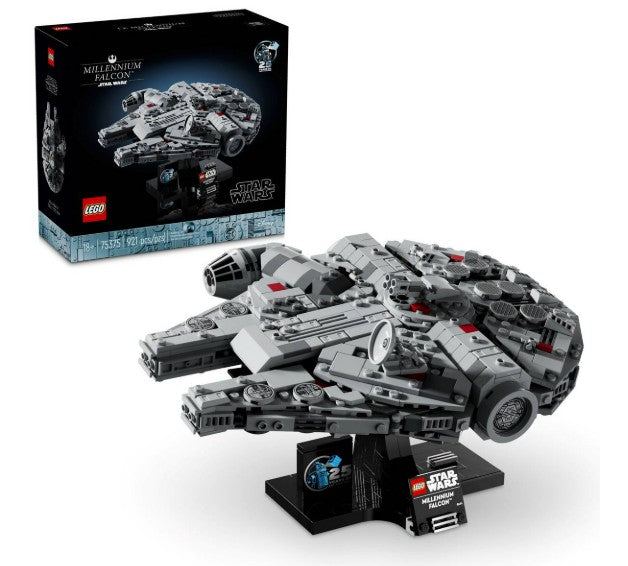 The LEGO Millennium Falcon model is displayed on a stand, with its box visible in the background. The box showcases the LEGO brand logo, the Star Wars logo, and an image of the completed buildable spacecraft.