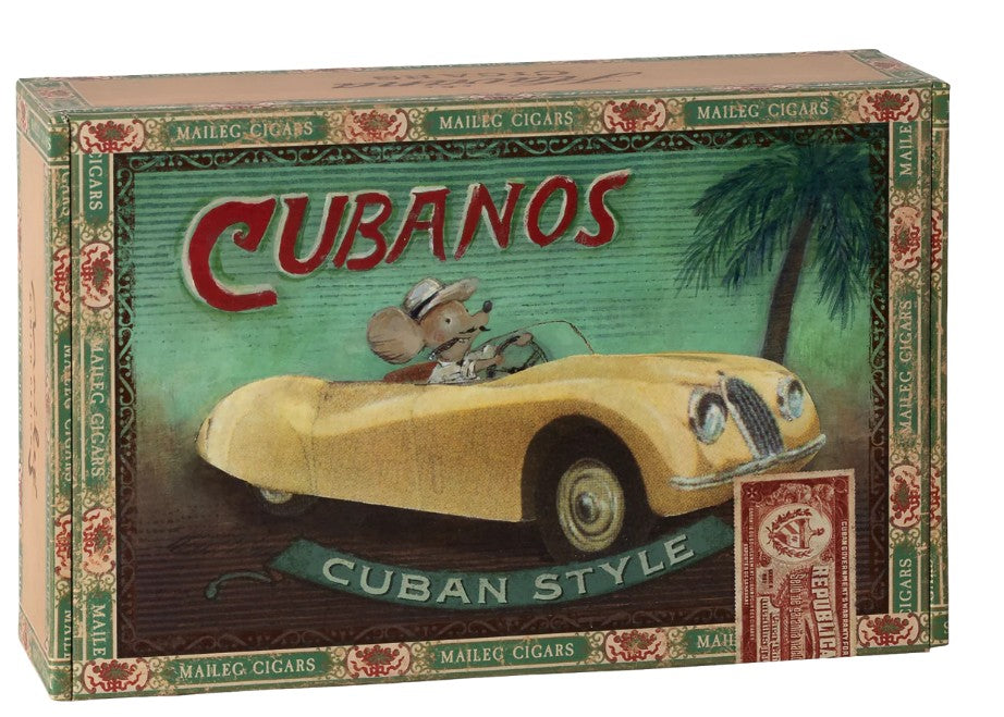 The Maileg Grandma And Grandpa Mice In Cigarbox by Maileg features a decorative box with ornate borders, depicting the Maileg family mice driving a yellow convertible amid palm trees in a Cuban-inspired design.