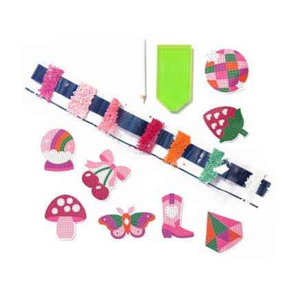 The Ooly Mini Razzle Dazzle: D.I.Y. Gem Sticker Kit - Magic includes a denim bracelet and sparkly gem stickers in fun shapes like fruit, boots, butterflies, mushrooms, and more—perfect for creating magical-themed designs. This mini craft kit comes with a green tray and stylus for applying gems—everything you need to start crafting!.