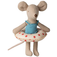 Maileg Beach Mouse With Float, Little Sister - Red Dots by Maileg stands upright in a blue swimsuit with a cream and red polka dot float—ideal for imaginative beach-themed play.