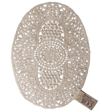 Maileg Lace rug, Mouse by Maileg: An oval-shaped, beige crocheted doily featuring intricate patterns—ideal as a lace rug for Maileg mouse miniature play—with a fabric tag attached to one edge.