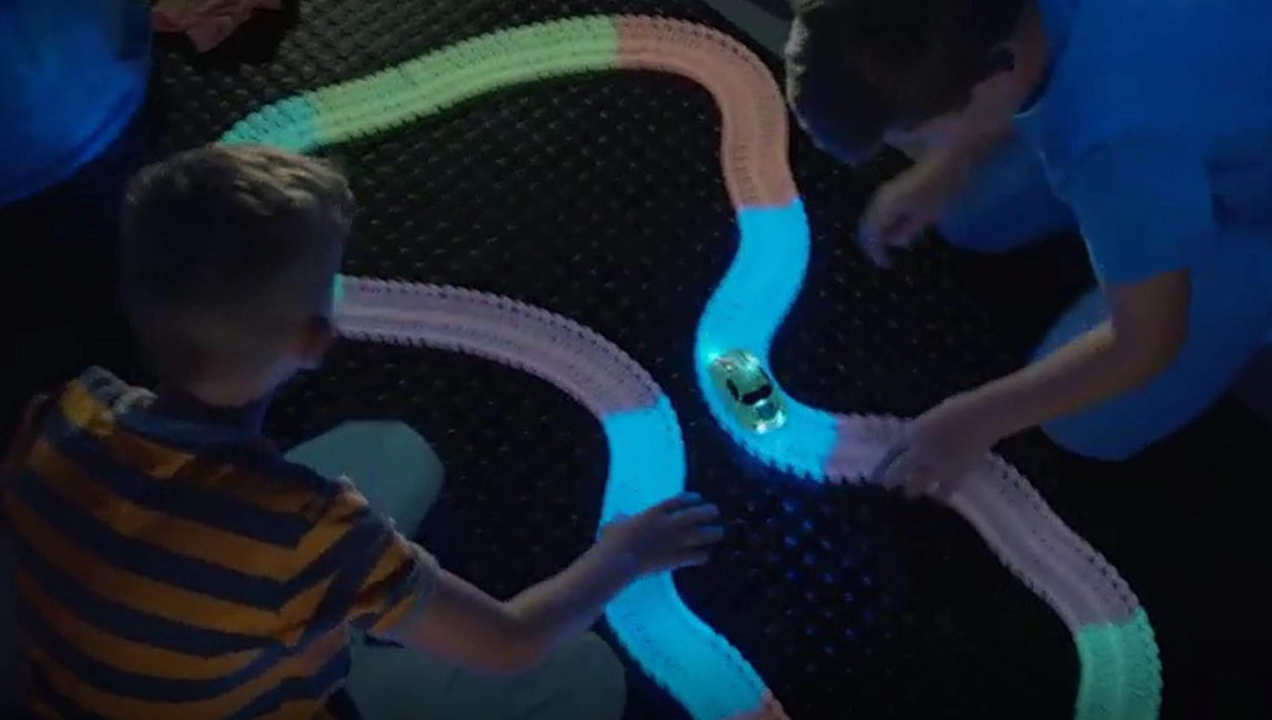 Mindscope Twister Tracks - Neon Glow-in-the-Dark Race Track |  | Safari Ltd®