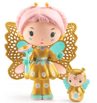 The DJECO Tinyly Hortense & Fly set by DJECO features an adorable doll from the Tinyly collection with butterfly wings, pink hair, and a gold dress holding a flower. Beside her is Fly—a small, coordinating gold and pink bee-like collectible figure—both adorned with pastel blue and pink accents, making them perfect for imaginative play.