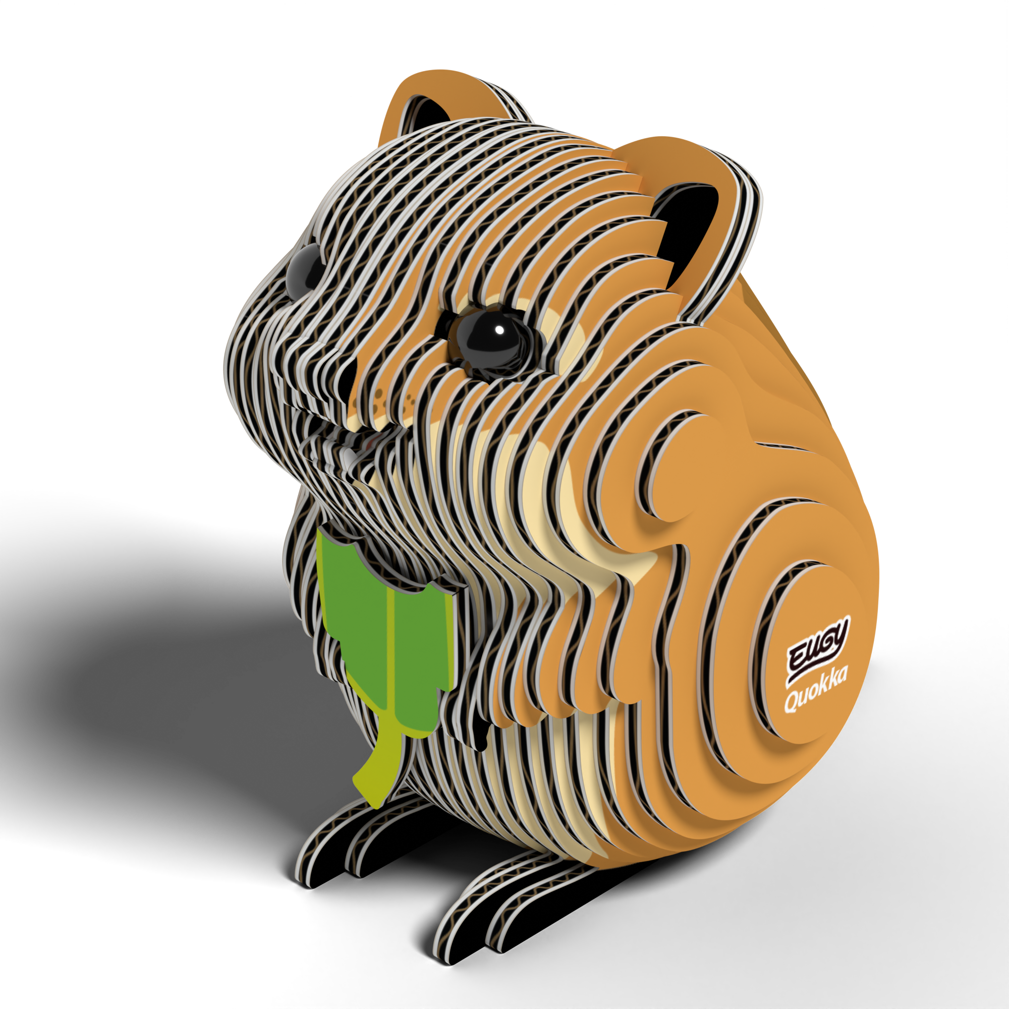 The Eugy EUGY Quokka 3D Puzzle is a layered wooden puzzle shaped like a smiling quokka holding a green leaf, featuring large, round eyes and the words "EUGY" and "Quokka" printed on its side. This adorable, eco-friendly STEM toy by Eugy is perfect for puzzle enthusiasts.