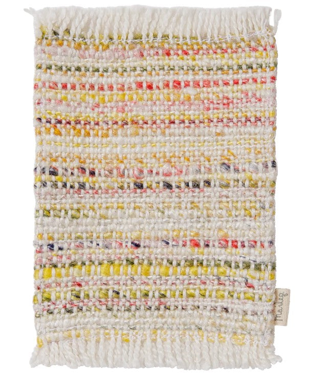 Introducing the Maileg Rug, Mouse, Mini - Multi Stripe by Maileg—a handwoven rectangular textile featuring a lively striped pattern in white, yellow, green, pink, and red threads. With its charming fringed edge and a small fabric tag on the lower right side, this mini rug is perfect as mouse room decor or as a colorful addition to your Maileg accessories collection.
