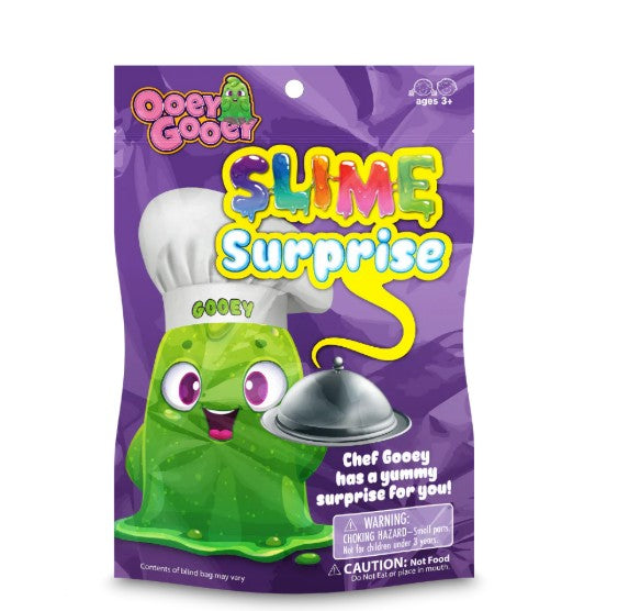 Art Creativity’s Ooey Gooey Slime Surprise comes in a purple package, featuring a cheerful green slime character sporting a chef’s hat and holding a silver platter. This playful slime container invites kids ages 3+ to uncover the mystery slime inside—just remember, while it looks delicious, it’s not food!.