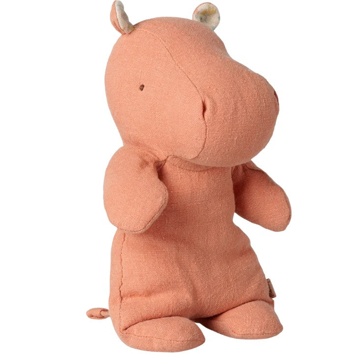 A soft, dusty coral Maileg Safari Friends Hippo (Small), featuring a cuddly design with petite ears and a simple stitched face, sits upright against a white background—perfect for imaginative play.