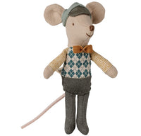 Maileg’s Driver Mouse, Little Brother, is an adorable stuffed toy mouse dressed in a blue and white argyle vest, yellow bow tie, gray pants, and a matching gray cap. With large pink ears and a long pink tail, this Maileg plush is ready to embark on imaginative road trip adventures and endless fun.