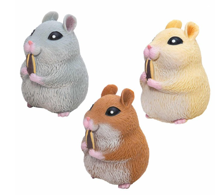 Three Schylling Toys Chonky Cheeks Hamster figurines in gray, yellow, and brown sit upright against a plain white background, each clutching sunflower seeds. With black eyes, pink paws, and textured fur details, these adorable sensory toys offer charming stress relief.