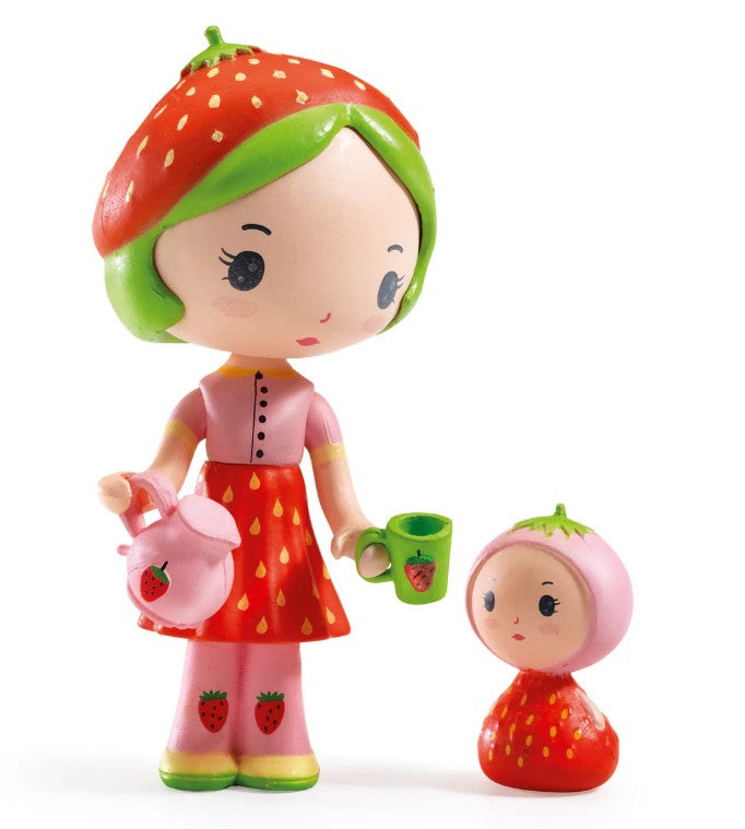 The DJECO Tinyly Berry & Lila collectible set by DJECO features two charming figurines dressed in strawberry-themed outfits—a girl holding a pink teapot and green mug, and a smaller Tinyly companion wearing a strawberry cap and red, seed-speckled attire—perfect for sparking imaginative play and delighting both children and collectors.