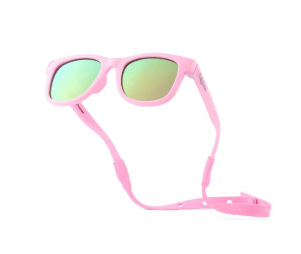 Baby Sunnies Barbie Pink Baby Polarized Sunglasses Strap UV Protection, featuring green-tinted lenses and an attached flexible strap for secure fit, are displayed on a white background.